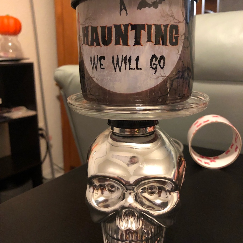 3 wick soy blend Halloween candle with skull candle holder.